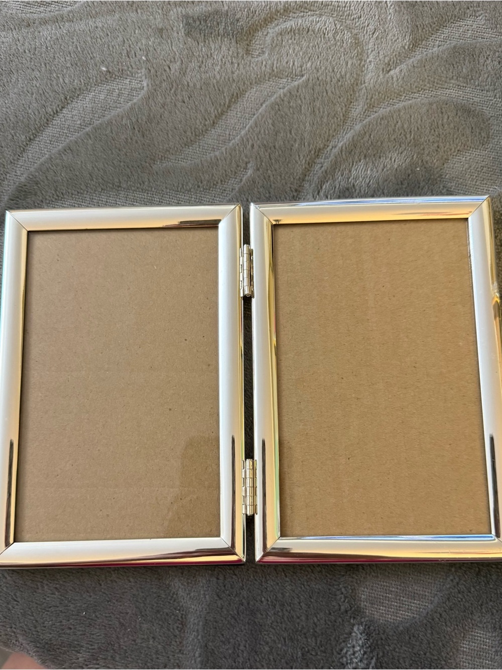 Double Hinged Gold Plated Metal Photo Frame Holds Two Photos. OSP